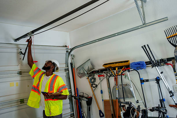 Professional Garage Door Panel Replacement technician working in Monticello, IA